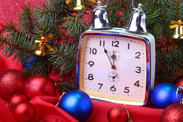 Christmas clock. New Year's Decoration with christmas balls and tree. Celebration Concept for New Year.