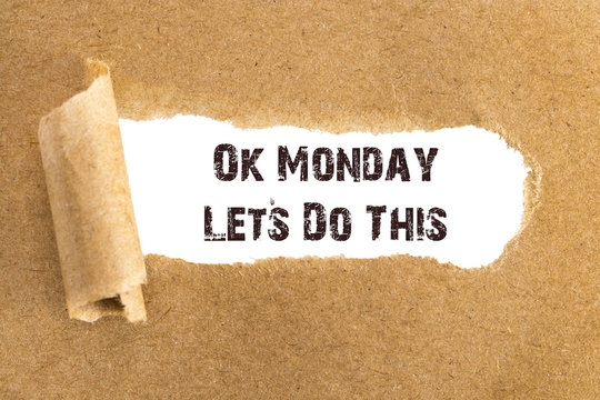 The text Ok Monday Lets Do This appearing behind torn brown paper