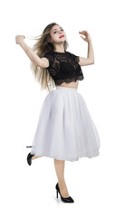 Naklejka premium Girl in white skirt posing.