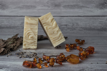 White handmade soap with tree bark and amber