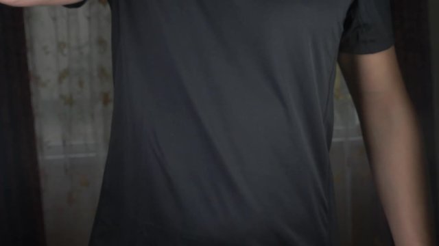 Slow motion. 4k. Young man making a protein shake at home. anonymously