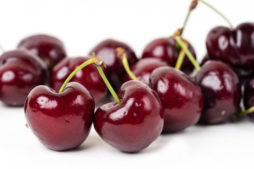 Red cherry fruits with white background