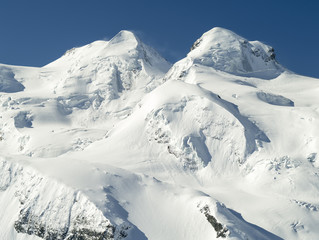 Fototapeta na wymiar aerial view to glacier in winter day in Switzerland
