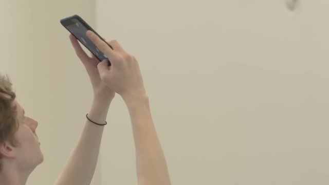 Internet blogger makes a panoramic selfi for a new post on the Internet