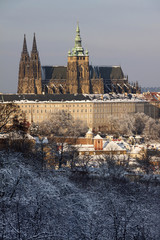 Christmas snowy Prague City with gothic Castle, Czech republic