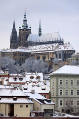Christmas snowy Prague Lesser Town with gothic Castle, Czech republic