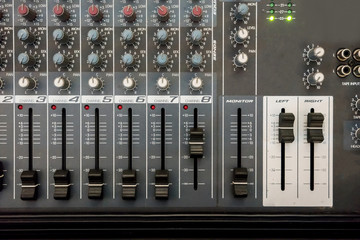 Close up of music mixer equalizer console for mixer control sound device. .