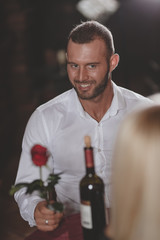 Handsome beautiful man on romantic dinner with his girlfriend.