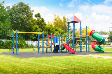Colorful playground on yard in the park. - Powered by Adobe