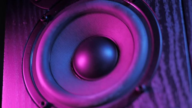 Hi end loudspeakers.Monitor hifi sound system for sound recording studio.Professional hi-fi speaker box.Audio equipment for home theater.Speakers boxes audio music concert. Pink light
