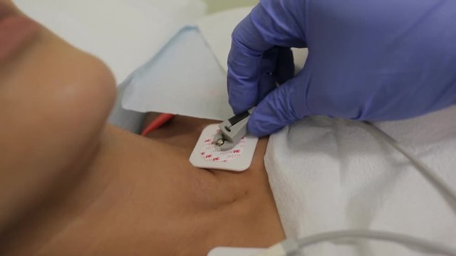 Doctor examining a patient's heart. Echocardiogram