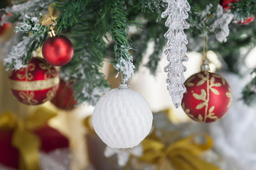 Fototapeta na wymiar Christmas toys on a Christmas tree closeup