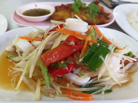 Papaya salad is popular in Thailand.