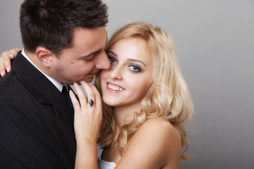 couple of lovers groom and bride studio shot