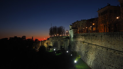 Fototapeta premium Bergamo, old city. Italy. Fiery sunset from the Venetian walls