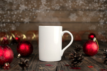 Obraz na płótnie Canvas Christmas concept composition with a mug on a wooden table.