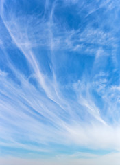 background of a blue sky with a white clouds