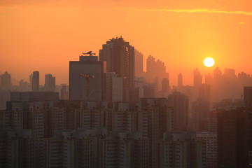 Fototapeta premium horizon sunset in hong kong with housing background