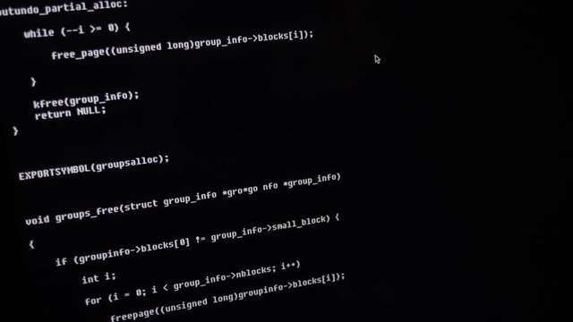 Close up view to screen computer laptop monitor. White letters on black background. Computer code. Hacker or programmer coding script exploit. Access granted denied. Download critical data.
