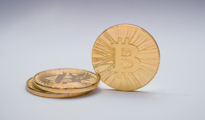 Golden bitcoin on isolated white background. Concept development. gold currency