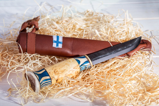 Traditional Finnish Belt Knife (Puukko) With Curving Cutting Edge And Leather Sheath Hand Crafted From Wood, Reindeer Horn And Steel, Finland's 100 Years Celebration