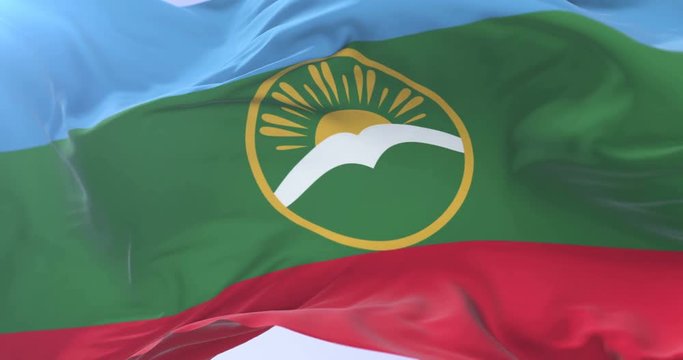 Flag of Karachay Cherkessia waving at wind in slow, loop