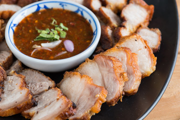 Deep Fried Crispy Pork Belly Cooked with Garlic and spicy dipping sauce