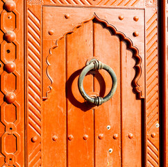 in oman antique door entrance and decorative   handle for background