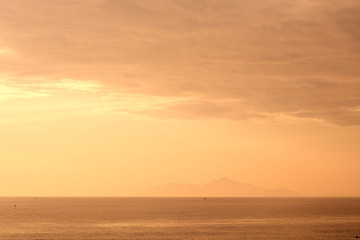 Fototapeta na wymiar Beautiful sunrise on the shore of South China Sea.