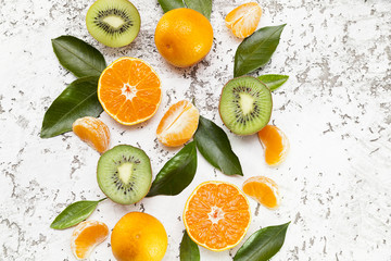 juicy mandarins and kiwi. Citrus. orange. fruit harvest