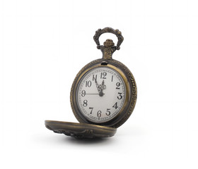 Fototapeta na wymiar Antique bronze pocket watch showing several minutes before midnight, isolated on white background. The concept of time, past or deadline.