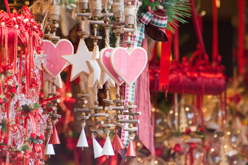 Wooden hearts and stars ornaments with small red and white bells