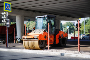 Asphalt compactor in the city