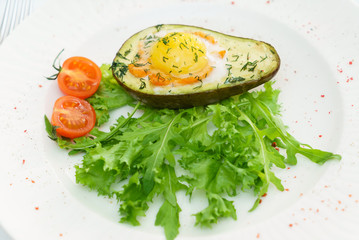 roasted avocado with salad