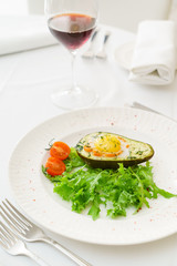 roasted avocado with salad