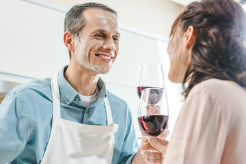 couple in flour with wine