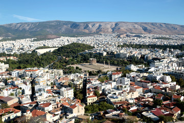 Temple of Olympian Zeus Olympieion as seen from Acropolis, Athens, Greece. Cityscape of Athens on background