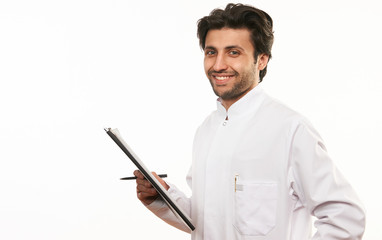 Young doctor holding document