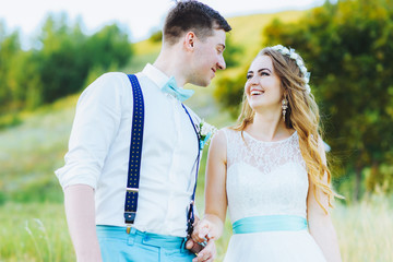 Obraz premium the bride and groom are photographed on the nature