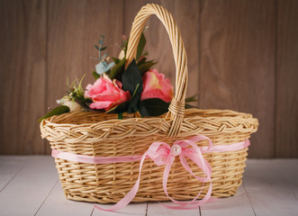 Fototapeta na wymiar handmade bamboo basket decorated with flowers
