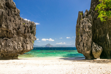 Beach between tall rocks