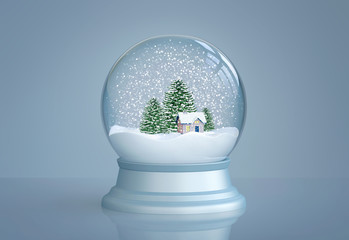 Snow globe with house and pine trees