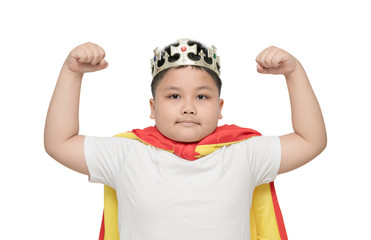 cute obese boy is showing muscle; isolated