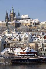 Christmas snowy Prague Lesser Town with gothic Castle, Czech republic