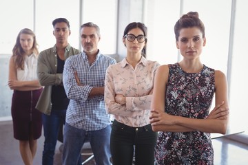 Fototapeta premium Creative business people standing together at office