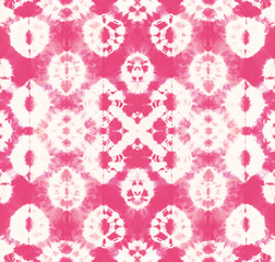 Seamless pattern, abstract tie dyed fabric of pink color on white cotton. Hand painted fabrics. Shibori dyeing