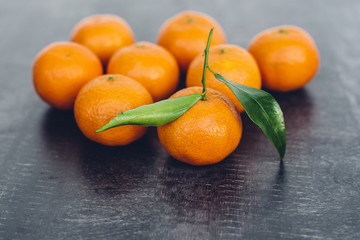 Ripe tangerines on table