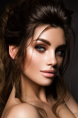 Fototapeta premium Beautiful woman with professional make up and hairstyle