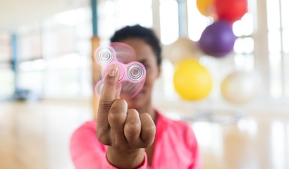Girl playing with fidget spinner 