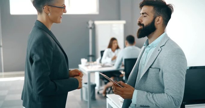 Picture of young architects discussing about project
